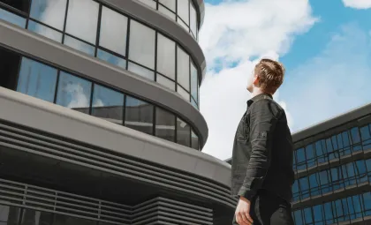 manpower hrvatska man looking at building